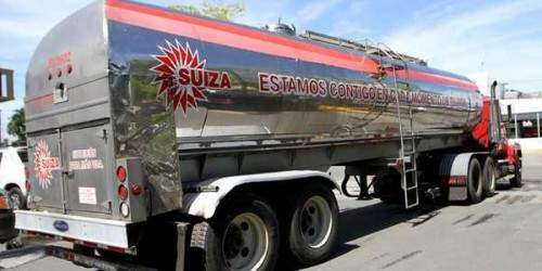 Obreros de Suiza Dairy amenazan con paro si cierran planta en Juncos