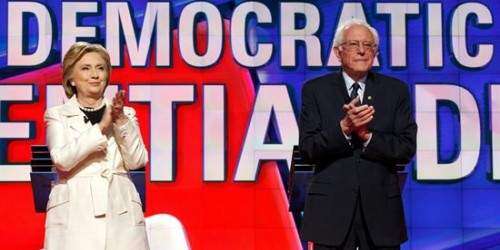 Clinton y Sanders participan en áspero debate