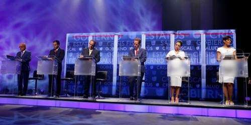 Indecisos meditan su voto en unas elecciones marcadas por la deuda