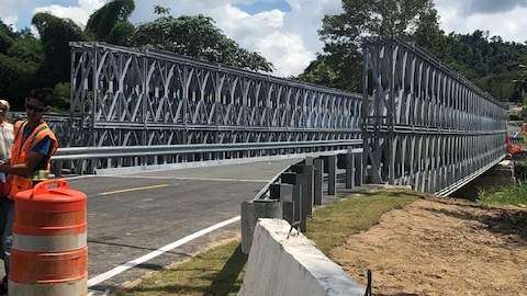 Abren puente en Utuado al son de Qué viva la Palma!
